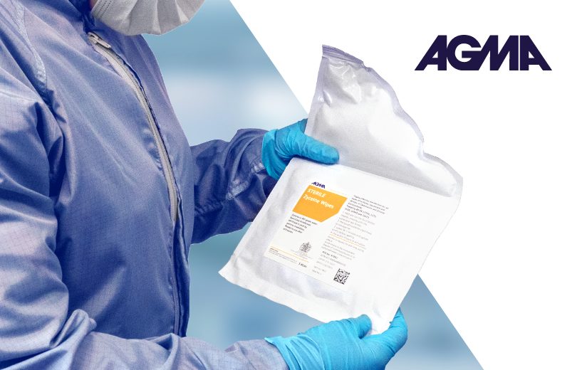 A person in lab safety gear holding the AGMA zyceine wipes